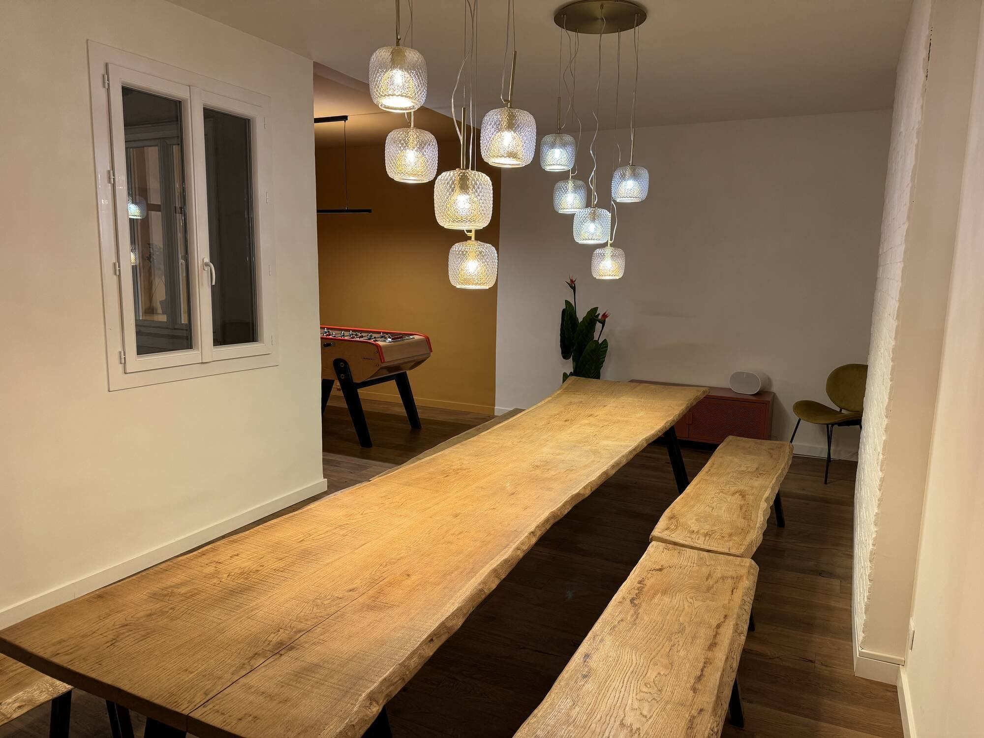 A big wooden table for eating or working together